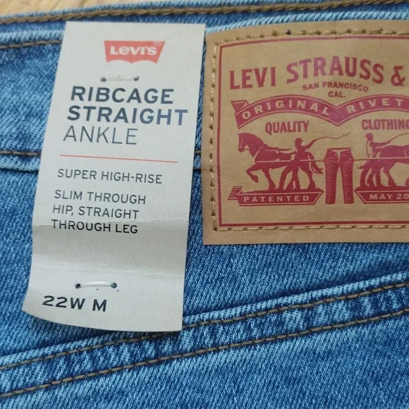 - Levi's ribcage straight ankle super high rise 5 pocket medium wash jeans