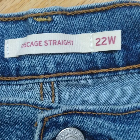 - Levi's ribcage straight ankle super high rise 5 pocket medium wash jeans