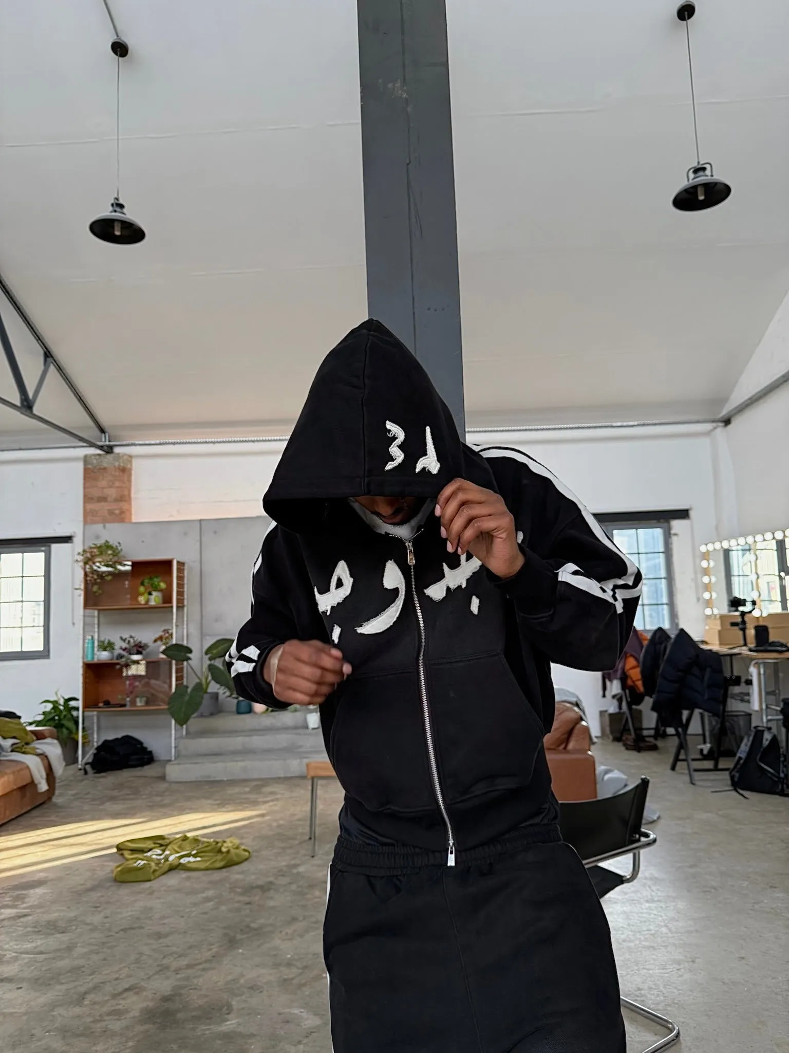 BLACK TRACKLINE ZIP UP