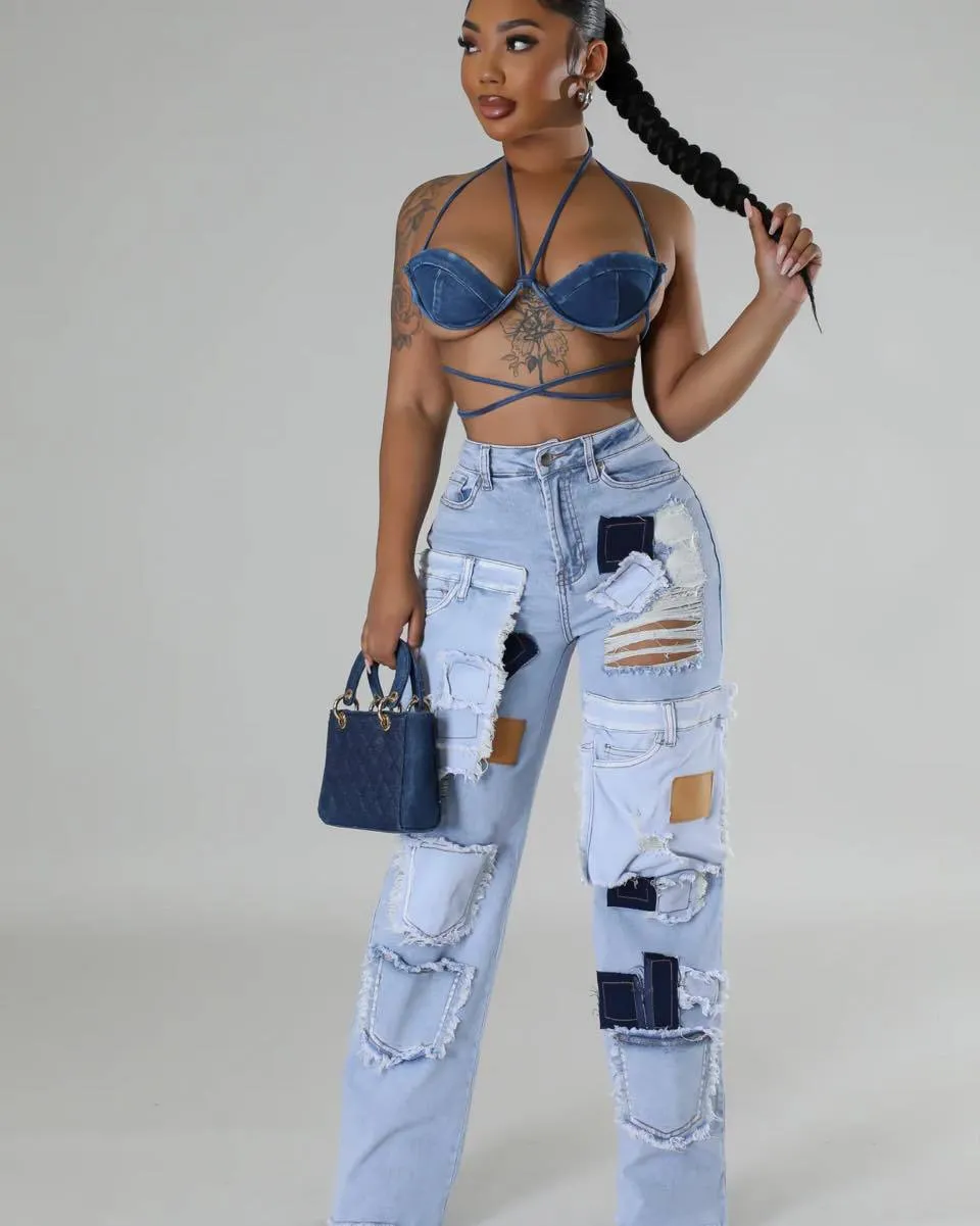 Bold Patchwork Ripped Denim Straight-Leg Jeans with Distressed Detailing