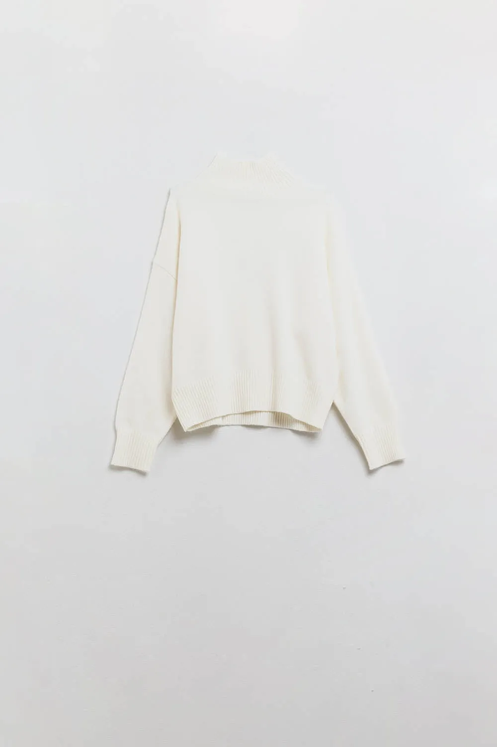chunky knit sweater in ecru with turtleneck