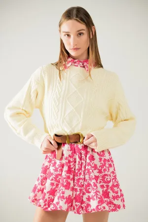 Cream soft knit sweater with cable pattern