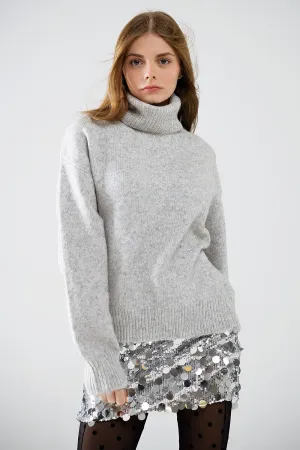 grey turtleneck jumper with dropped sleeves