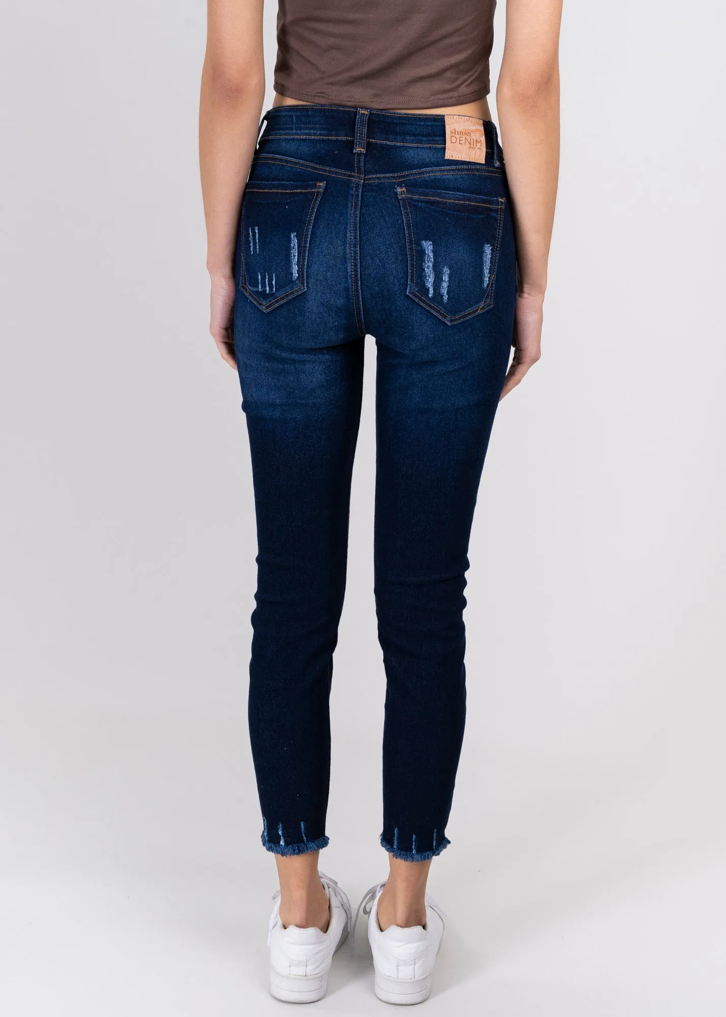 Jeans cintura media destrucciones flecos
