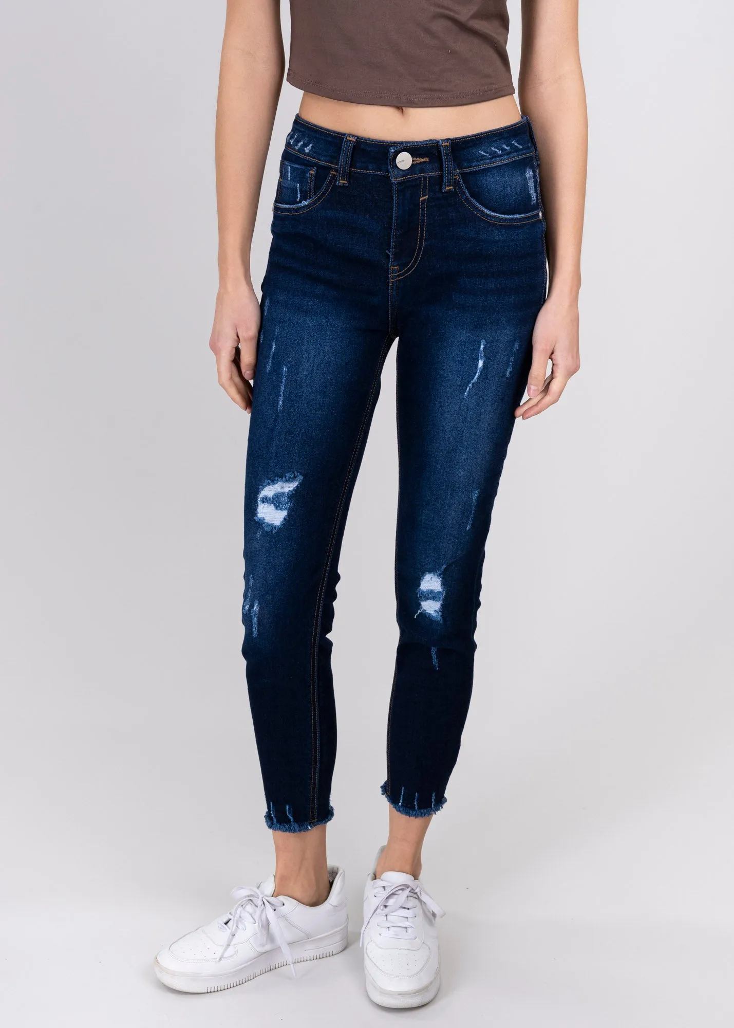 Jeans cintura media destrucciones flecos