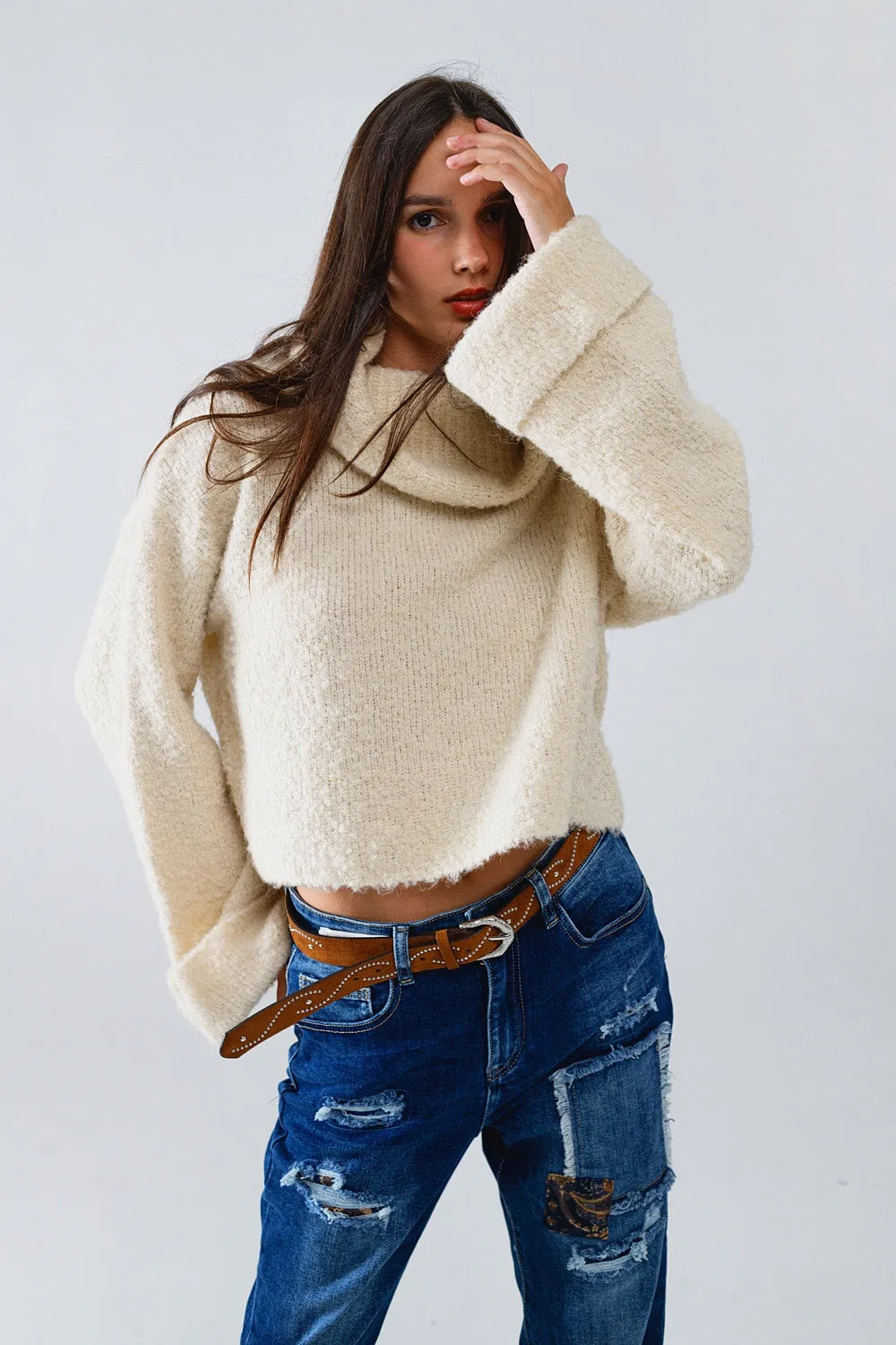 knitted fluffy high neck sweater in beige
