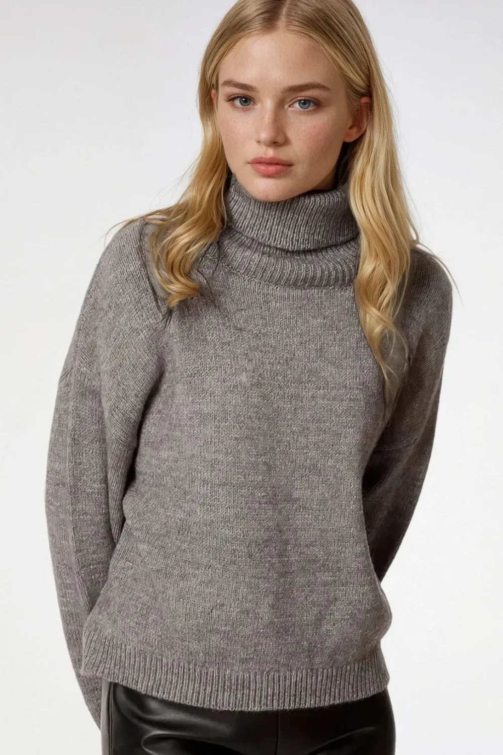 Loose grey sweater with dropped sleeves