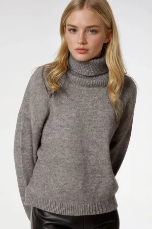 Loose grey sweater with dropped sleeves