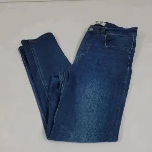 Reformation Harper High Rise Skinny Jeans in Neris