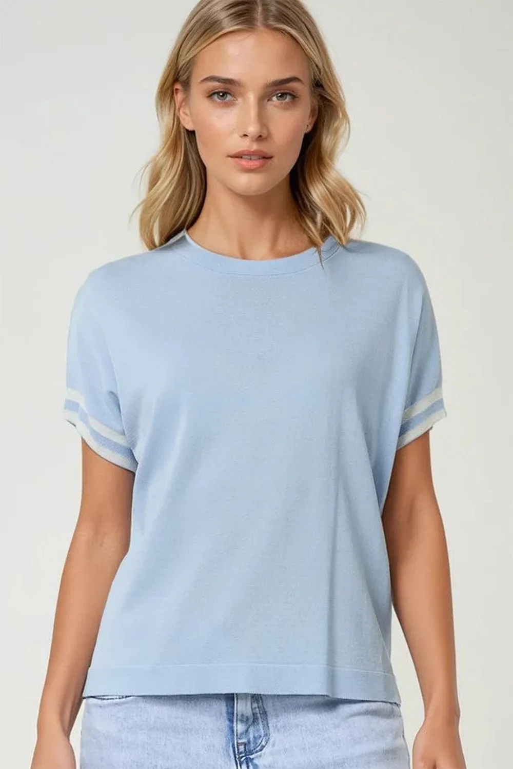 Sweater In baby Blue with white contrast detail